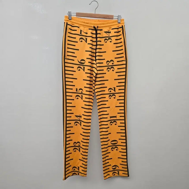 [BUNJANG] Adidas x Jeremy Scott Deep Yellow Tape Measure Track Pants / 아디다스 x 제러미 스콧 딥 옐로우 테이프 메져 트랙 팬츠