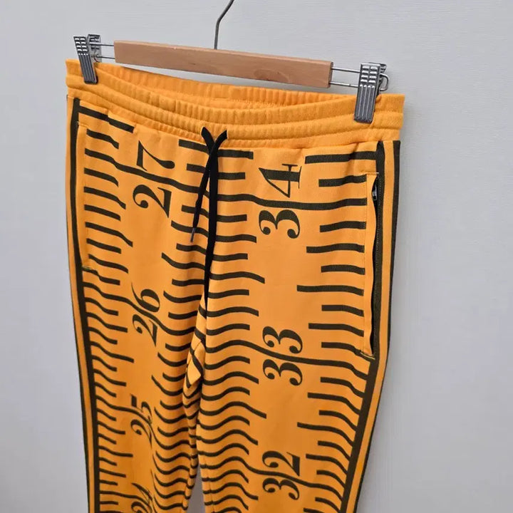 [BUNJANG] Adidas x Jeremy Scott Deep Yellow Tape Measure Track Pants / 아디다스 x 제러미 스콧 딥 옐로우 테이프 메져 트랙 팬츠