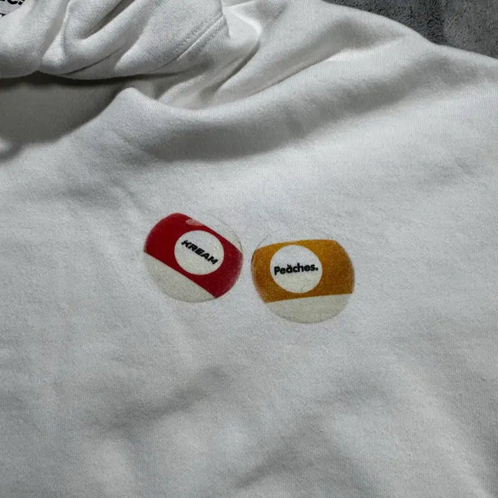 [BUNJANG] KREAM x PEACHES Collaboration Pocket Ball Hoodie / 크림 X 피치스 콜라보 포켓볼 후드티