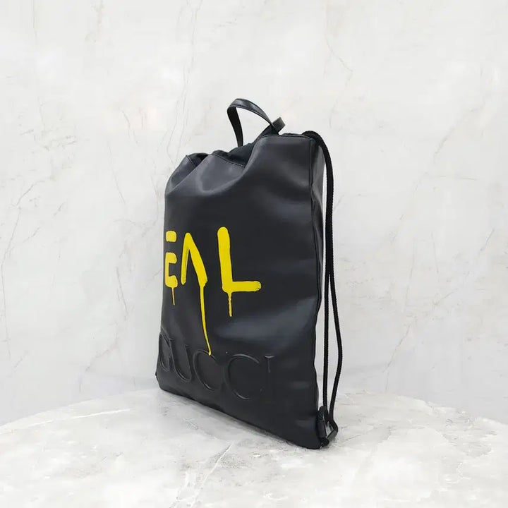 [BUNJANG] Gucci Ghost Yellow Painted Leather Drawstring Backpack 474193 / 구찌 고스트 옐로우 페인팅 레더 드로우스트링 백팩 474210