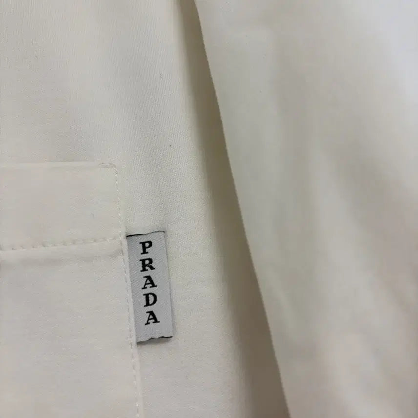 [BUNJANG] Prada Pocket Embroidery Tab T-Shirt / [정품] 프라다 포켓 자수 탭 반팔티 2XL(110)