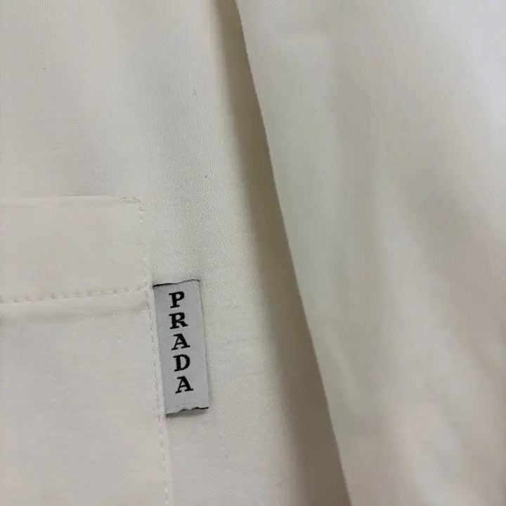 [BUNJANG] Prada Pocket Embroidery Tab T-Shirt / [정품] 프라다 포켓 자수 탭 반팔티 2XL(110)