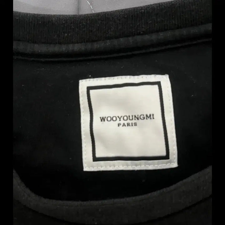 [BUNJANG] Wooyoungmi Paris Back Logo Embroidered Short Sleeve T-Shirt Black / 우영미 파리 백로고 자수 반팔 티셔츠 50