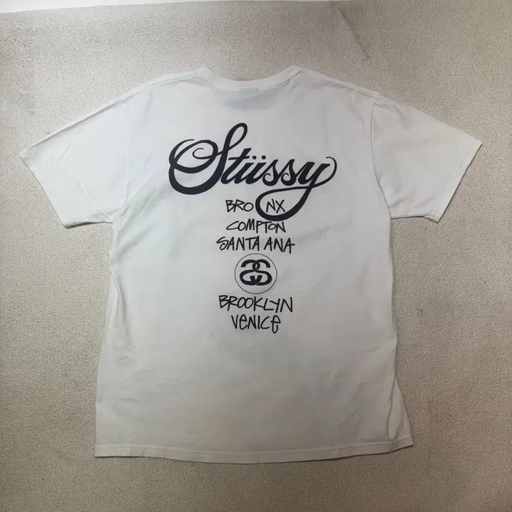 [BUNJANG] Stussy World Tour Cotton T-Shirt / 100 스투시월드투어 코튼 반팔티