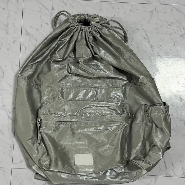 [BUNJANG] Fennec Drawstring Backpack Silver / fennec 페넥 드로우스트링 백팩 실버