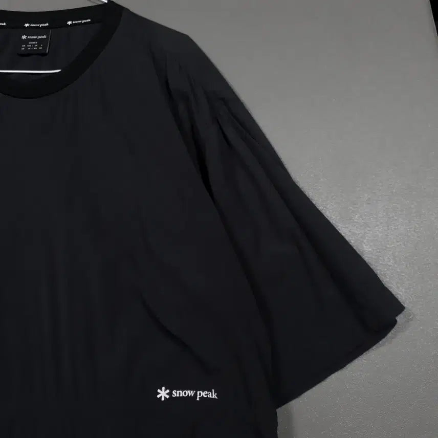 [BUNJANG] Snow Peak Synthech Light Zip Pocket Short Sleeve T-Shirt Black L / L (100) 스노우피크 씬테크 라이트 지퍼 포켓 우븐 반팔티 블랙