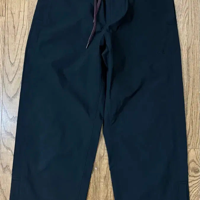[BUNJANG] Uniqlo JW Anderson Track Pants Black / [S] 유니클로 JW앤더슨 트랙팬츠 블랙