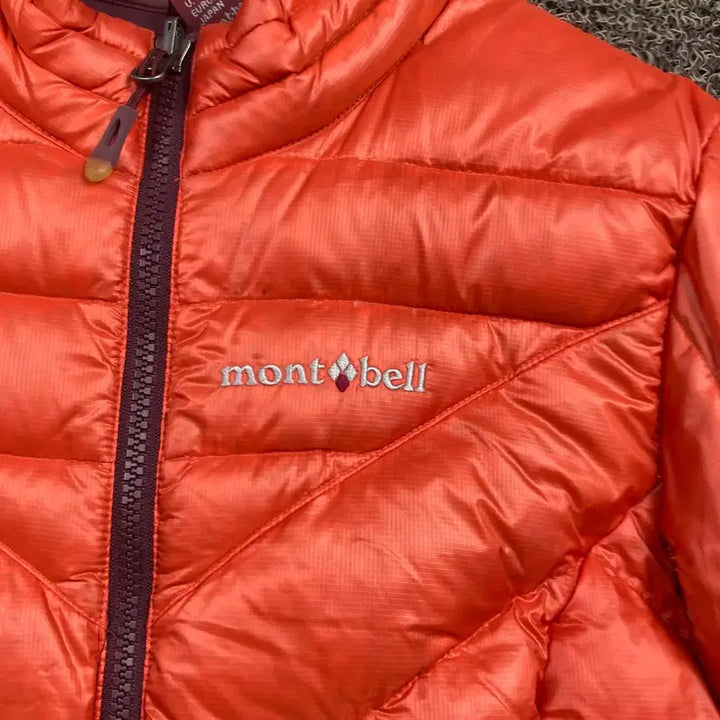 [BUNJANG] Montbell Embroidered Logo Wind Orange Quilting Lightweight Padded Jacket / 몽벨 자수로고 윈드 오렌지 퀼팅 경량 패딩