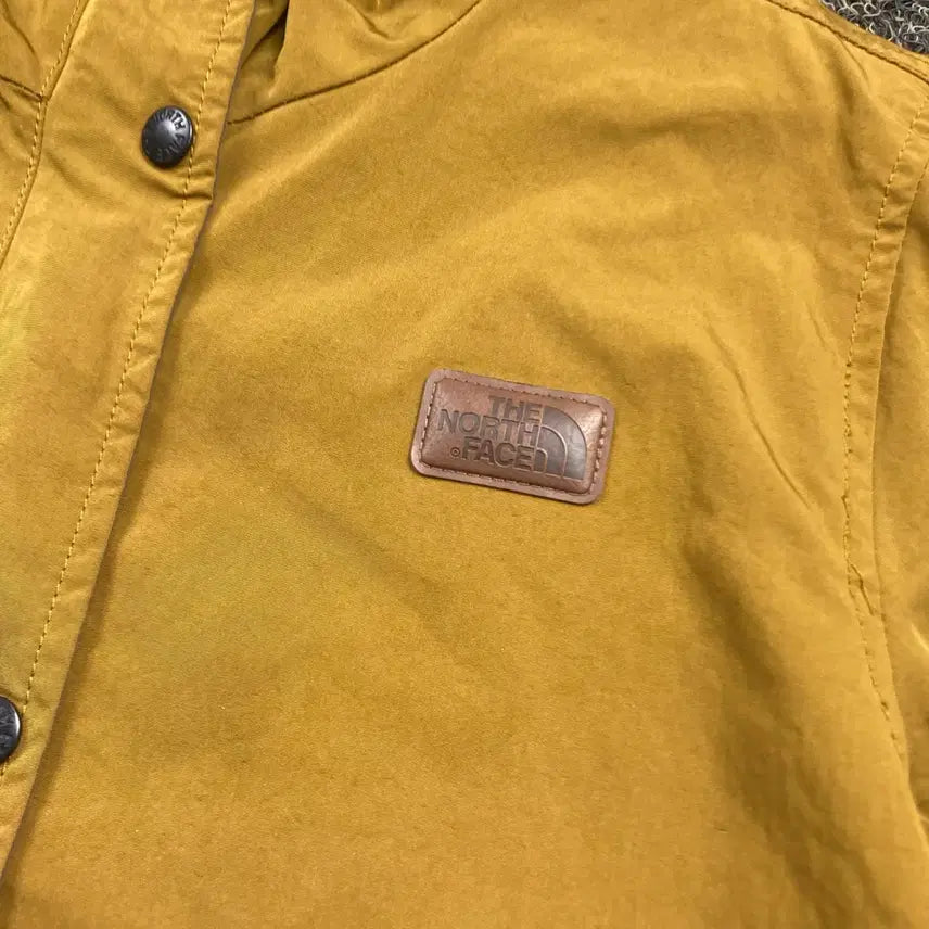 [BUNJANG] The North Face Leather Logo Waxed Cotton Jacket / 노스페이스 가죽로고 왁스 코트 바람막이 자켓