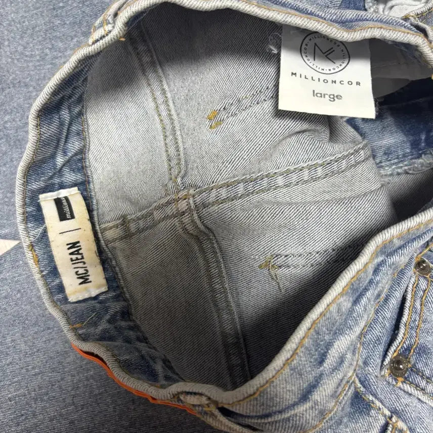 [BUNJANG] Million Kor Bootcut Jeans / 밀리언코르 부츠컷 청바지