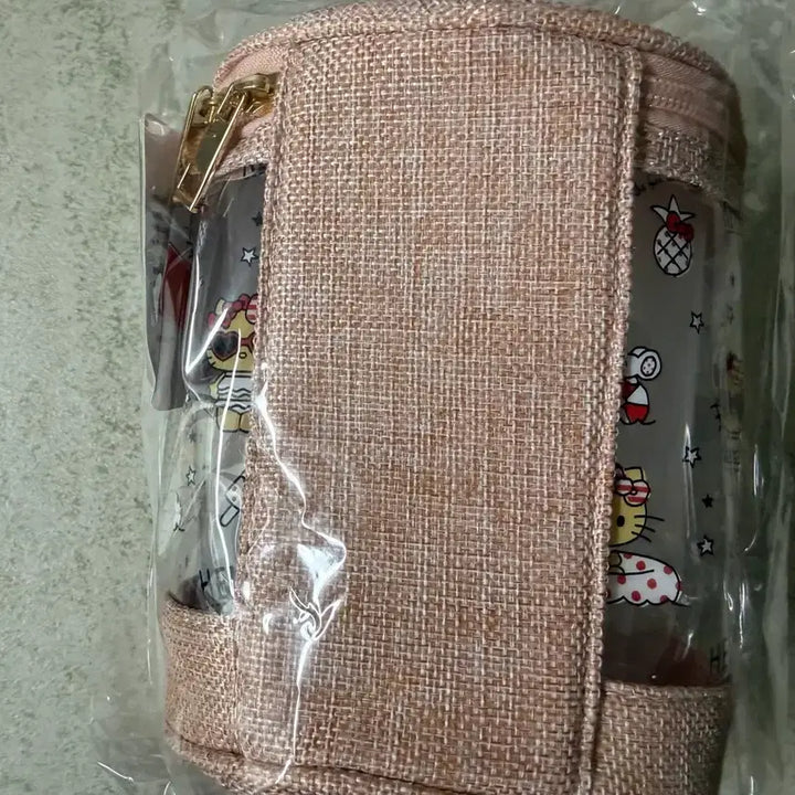 [BUNJANG] Sanrio Limited Edition Tanning Kitty Pink Cylinder Pouch / 산리오 한정판 태닝키티 핑크 원통 파우치