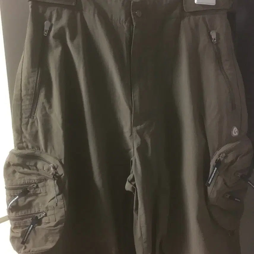 [BUNJANG] Smart Urban Useful (SUU) / KOISEIO Circle Pocket Pants Brown / 스마트어반유즈풀 suu 코이세이오 써클 포켓 팬츠 브라운