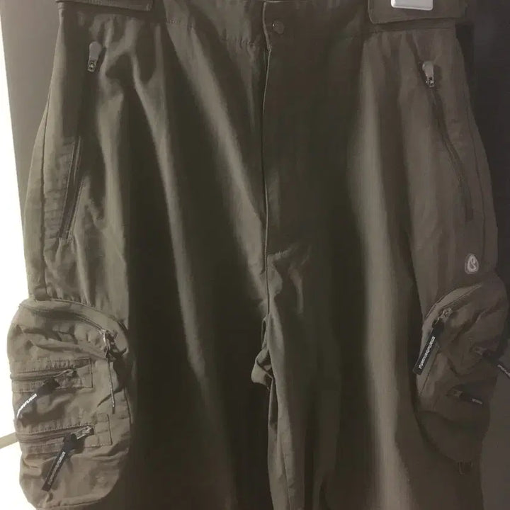 [BUNJANG] Smart Urban Useful (SUU) / KOISEIO Circle Pocket Pants Brown / 스마트어반유즈풀 suu 코이세이오 써클 포켓 팬츠 브라운