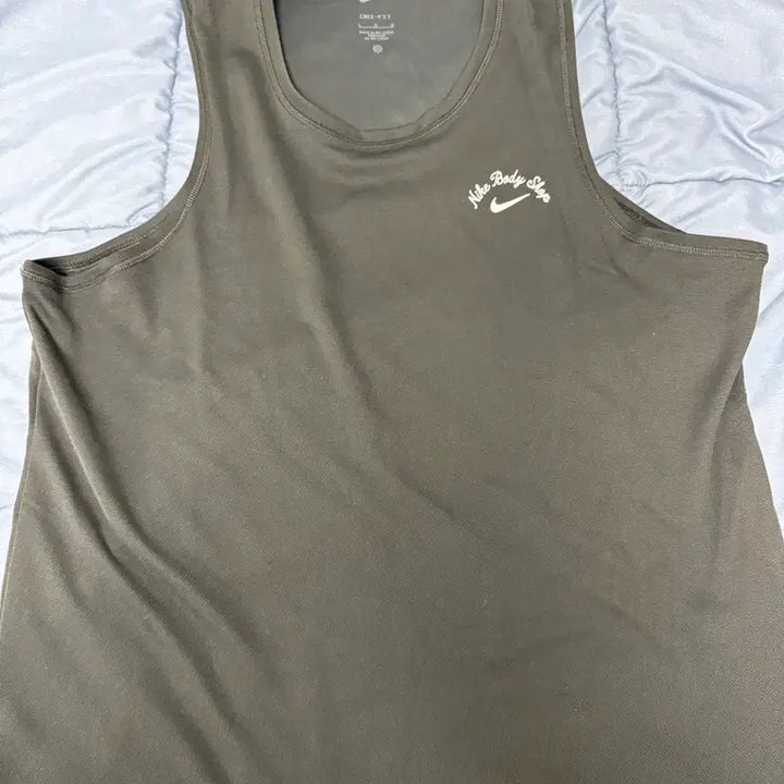 [BUNJANG] Nike x The Body Shop Sleeveless T-Shirt / 나이키 바디샵 콜라보 민소매티셔츠