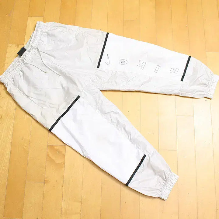 [BUNJANG] Nike Windbreaker Pants (Women&