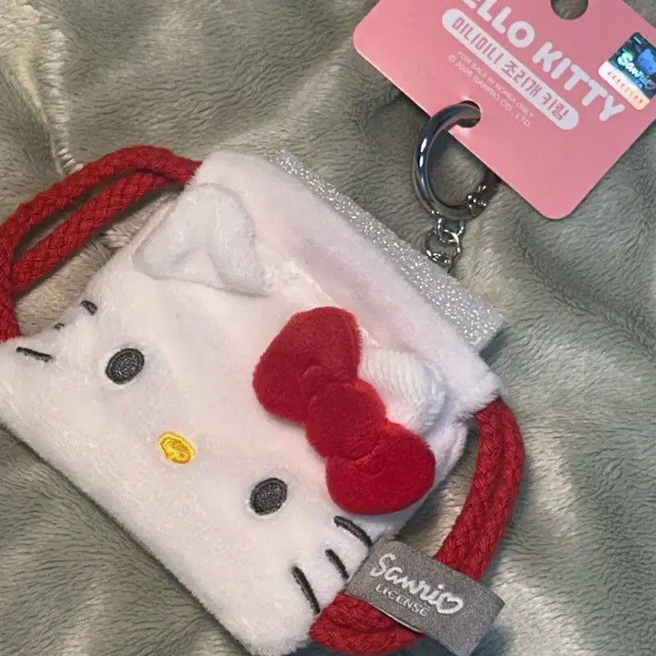 [BUNJANG] Sanrio Hello Kitty Mini Pouch Keychain (Airpod, Coin Pouch) / 택0,새상품) 산리오 헬로키티 미니 파우치 키링(에어팟,동전 파우치)