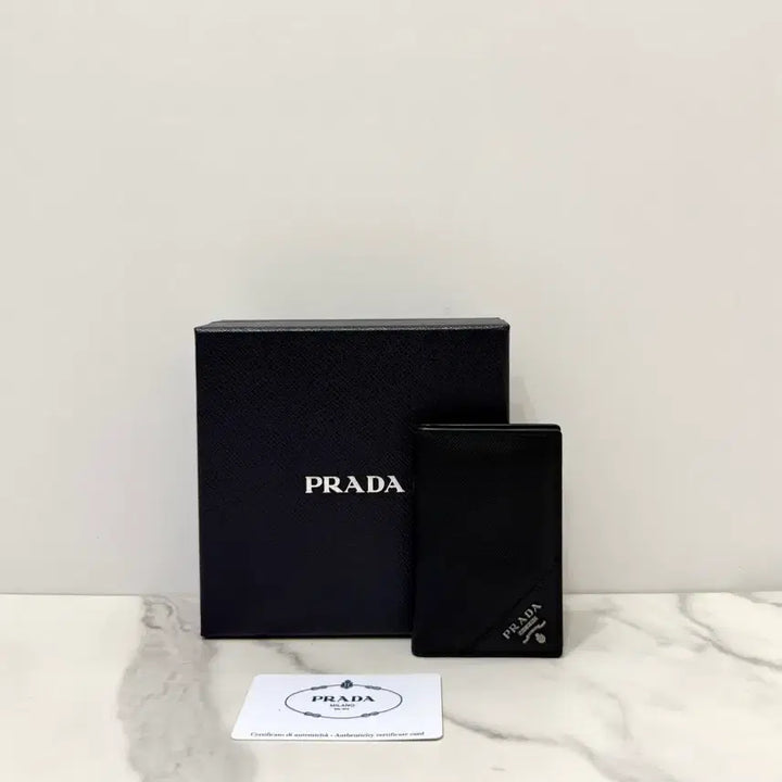 [BUNJANG] PRADA Saffiano Leather Metal Logo Flap Card Wallet / 프라다 사피아노 레더 메탈로고 플랩 카드지갑 반지갑 2MC101