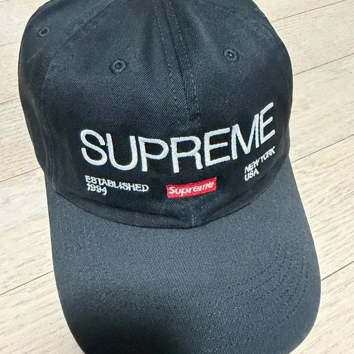 [SOLD OUT] 슈프림 Est. 1994 6-패널 캡 블랙 - 21FW