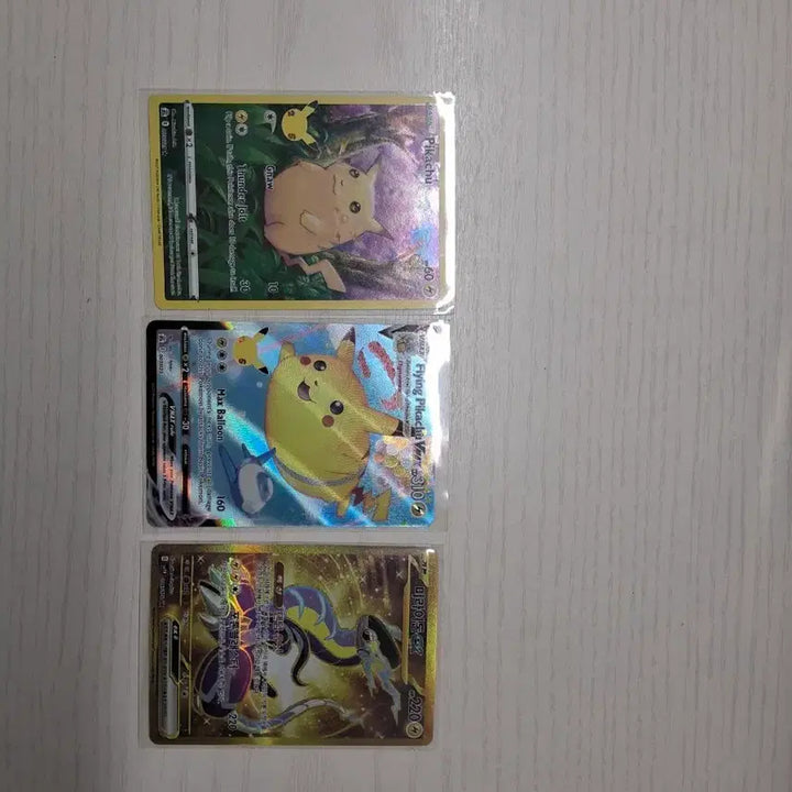 [BUNJANG] 25th Anniversary Pikachu (Chubby, Sky Attack) North American Version, Miraidon UR / 포켓몬카드 25주년 피카츄 (뚱뚱이, 공중날기) 북미판, 미라이돈 ur