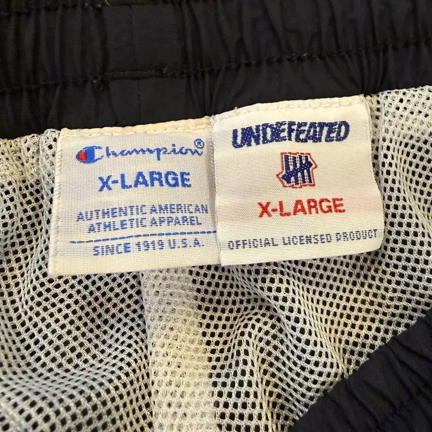 [BUNJANG] Champion x Undefeated Collaboration Nylon Track Pants Black / [XL] 챔피온 x 언디핏 콜라보 나일론 트랙 팬츠 블랙
