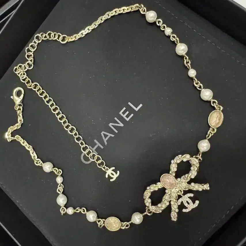 [BUNJANG] Chanel Pearl Ribbon Necklace / 샤넬 진주 리본 목걸이