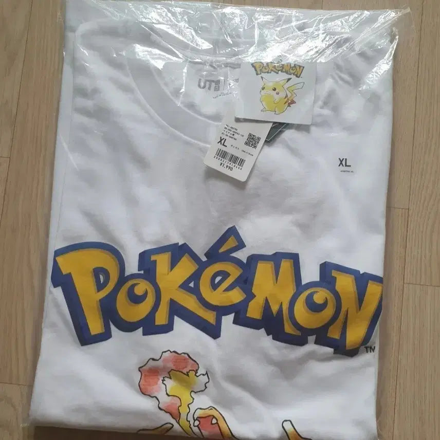[BUNJANG] Uniqlo Pokemon Charizard Short Sleeve T-Shirt XL / 유니클로 uniqlo 포켓몬스터 pokemon 리자몽 반팔 티셔츠