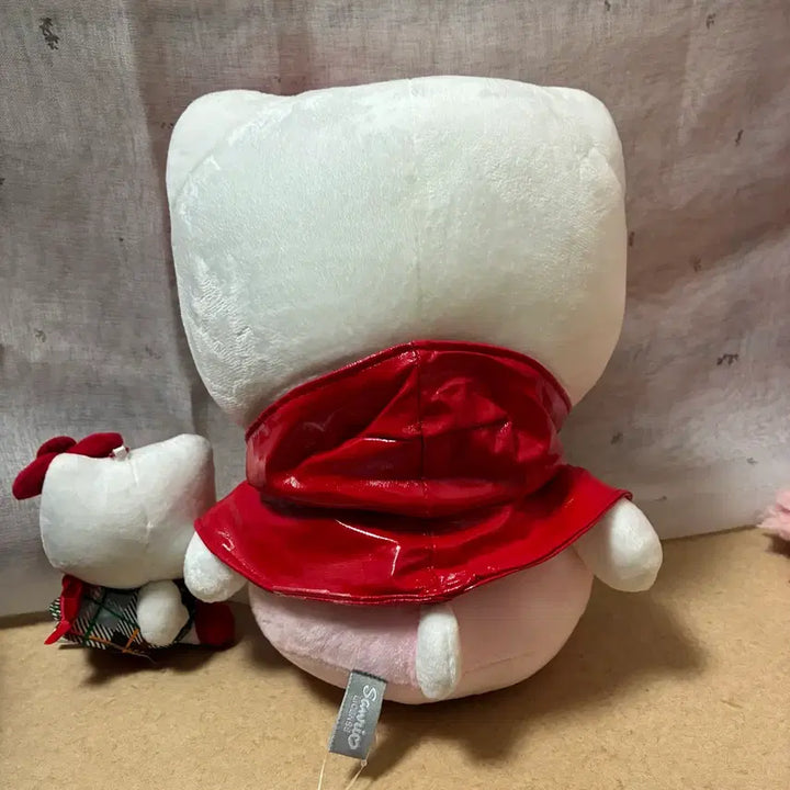 [BUNJANG] Hello Kitty Raincoat Plush Doll / 헬로키티 우비 인형