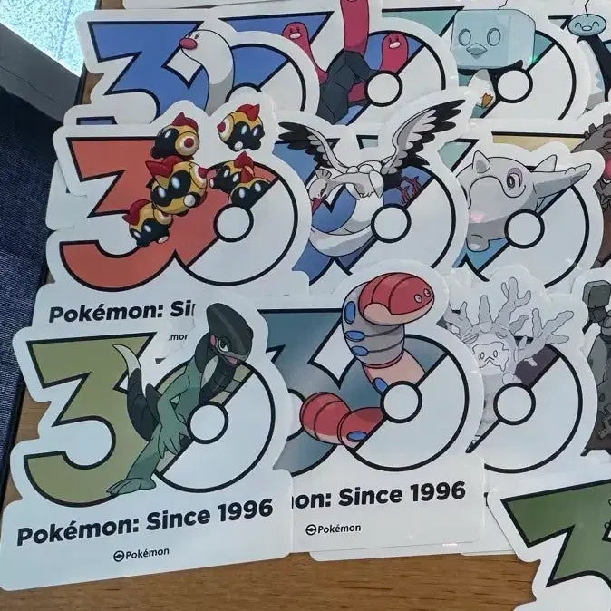 [BUNJANG] Pokemon 30th Anniversary Logo Sticker Bundle Set / 일괄)) 리자몽 오거폰 무쇠무인 등 포켓몬 30주년 로고 스티커 원가양도