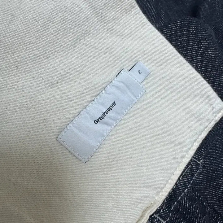 [BUNJANG] Graphpaper Colorfast Denim Two Tuck Pants Navy / [2]그라프페이퍼 컬러패스트 데님 투턱 팬츠