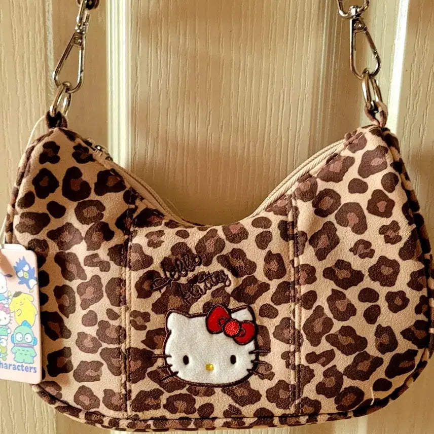 [BUNJANG] Sanrio Hello Kitty Leopard Pattern Hobo Bag with Bee Charm / 헬로키티 레오파드 패턴 숄더백 + 꿀벌 키링(새상품)