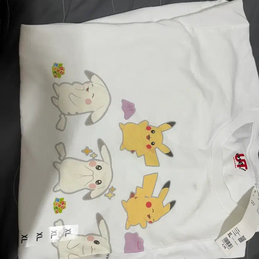 [BUNJANG] Uniqlo Pokemon U-T-Shirt Pikachu Metamon XL / 일본유니클로 포켓몬 u-티셔츠 xl 피카츄메타몽