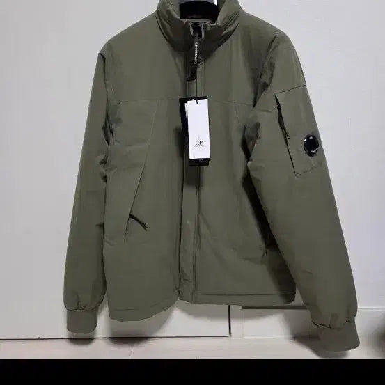 [BUNJANG] C.P. Company PRO-TEK Jacket with Lens Appliqué - Khaki / C.P. Company CP컴퍼니 PRO-TEK 와펜 패딩 신품급 헐값