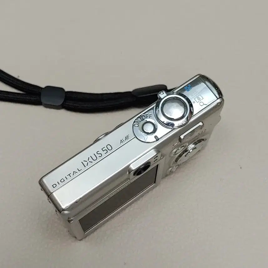 [BUNJANG] Canon Digital IXUS 50 Camera Kit with Charger, SD Card, and Pouch / 캐논 디지털 IXUS 50 카메라 본체 + 충전기 + SD카드 + 파우치