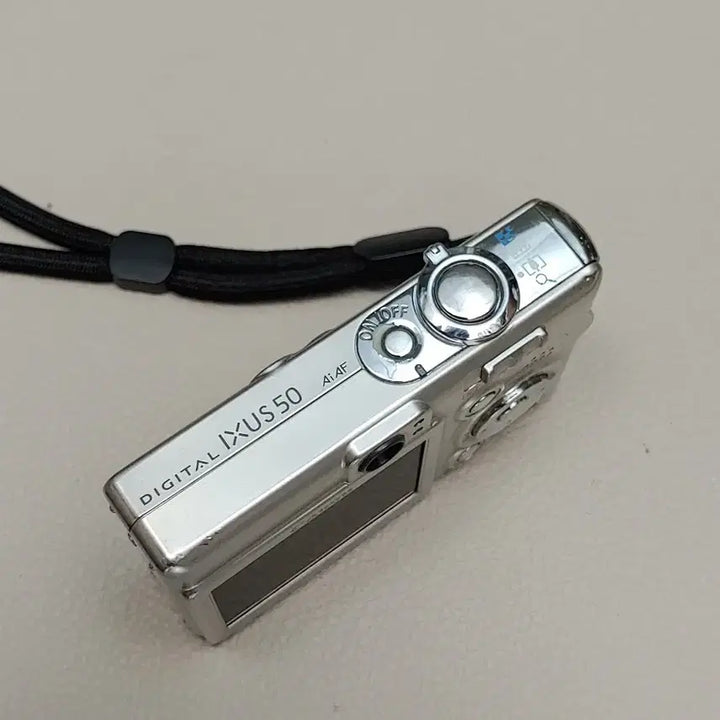 [BUNJANG] Canon Digital IXUS 50 Camera Kit with Charger, SD Card, and Pouch / 캐논 디지털 IXUS 50 카메라 본체 + 충전기 + SD카드 + 파우치