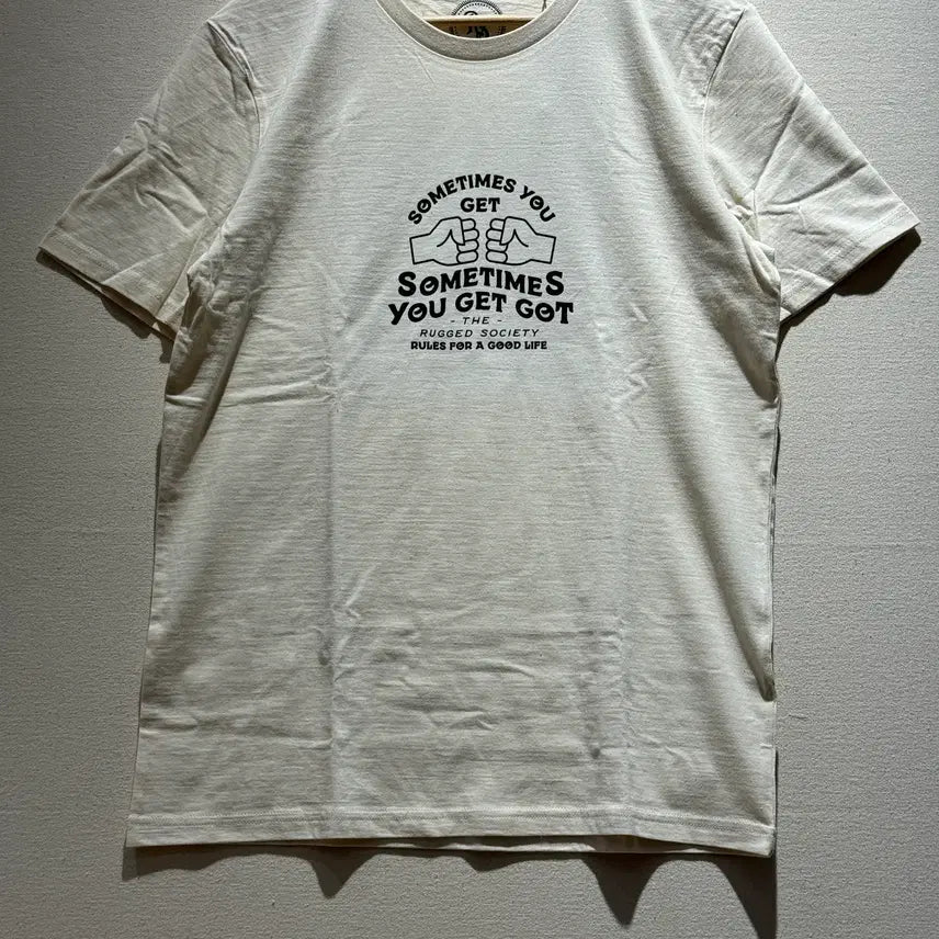 [BUNJANG] The Rugged Society Graphic T-Shirt Natural Cream Cotton / The Rugged Society 슬로건 레터링 그래픽 티셔츠