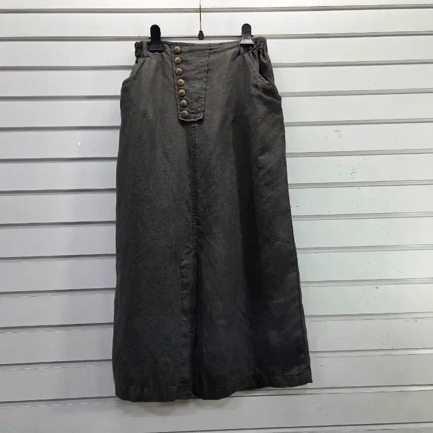 [BUNJANG] Treasure Hunter Angel Twill Cotton Blend Slit Button Detail Elastic Long Skirt / 진카키 면마혼방  앞트임 단추장식 밴딩 롱스커트/보물찾기천사