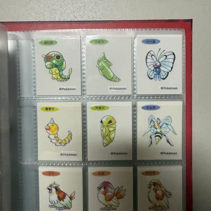 [BUNJANG] Pokemon 30th Anniversary Artwork Ttibusil Set (100 pcs) + Charizard Ttibusil Book / 포켓몬 30주년 아트워크 띠부씰 100장 + 리자몽 띠부씰북
