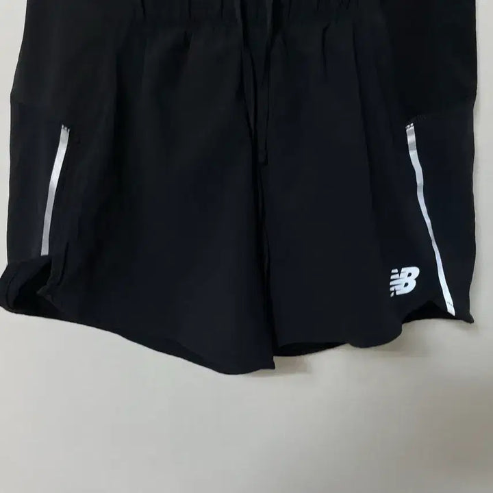 [BUNJANG] New Balance 55 Functional Stretch Banding Shorts / 55 뉴발란스 러닝 기능성 스판 밴딩 반바지 정품