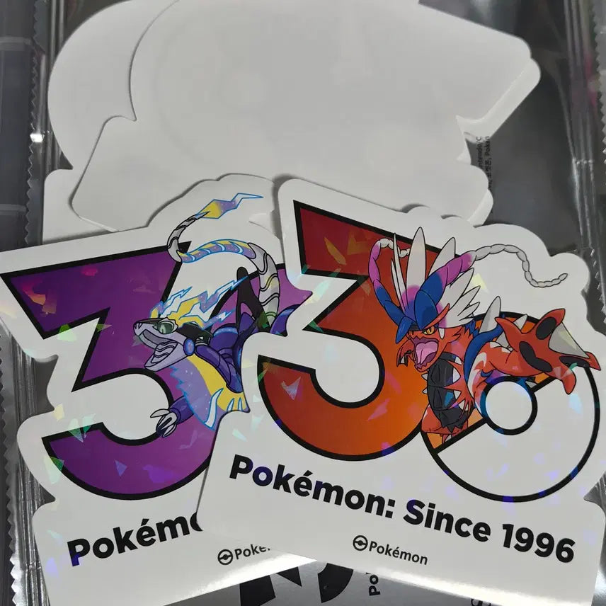[BUNJANG] Pokemon 30th Anniversary Logo Sticker Set (Miraidon, Koraidon, 3 Random) / 포켓몬 30주년 로고 스티커 미라이돈+코라이돈+랜덤3장