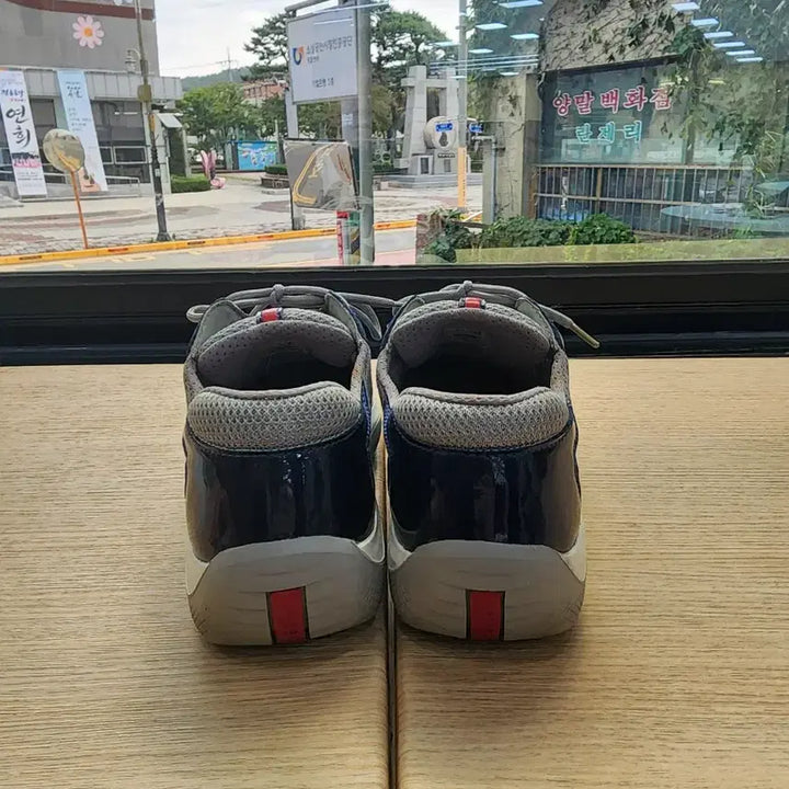[SOLD OUT] 프라다 아메리카 컵 유광 네이비 eu 39