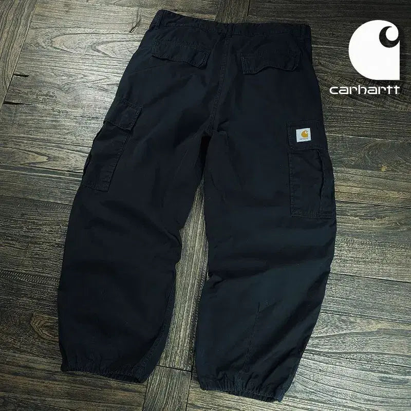 [SOLD OUT] 칼하트 윕 로고 패치 와이드 콜 카고 팬츠 블랙 M21272
