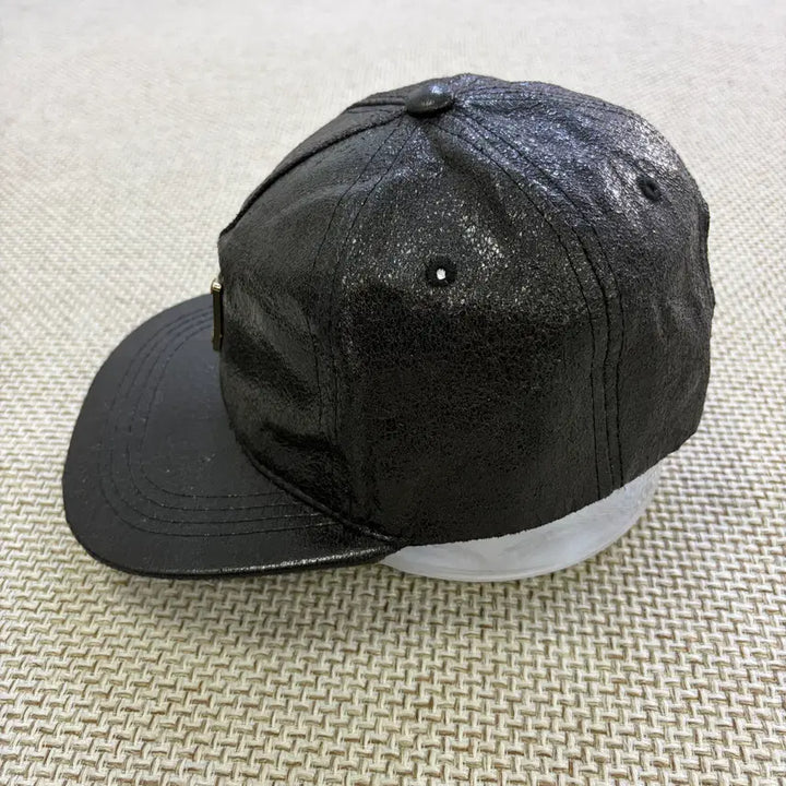 [SOLD OUT] F 헤이터 가죽 스냅 모자 0623D1