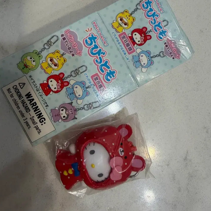 [BUNJANG] Sanrio Chibi-Tomo Rainbow Raincoat Kitty / 산리오 치비토모 우비 키티 새상품