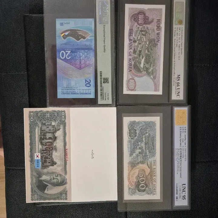 [BUNJANG] PMG Graded Banknotes Collection: 3 Types Including Beijing Olympics &amp; Sejong 100 Won Album / PMG 등 그레이딩 지폐 3종 및 세종 백원첩 등 총 4종