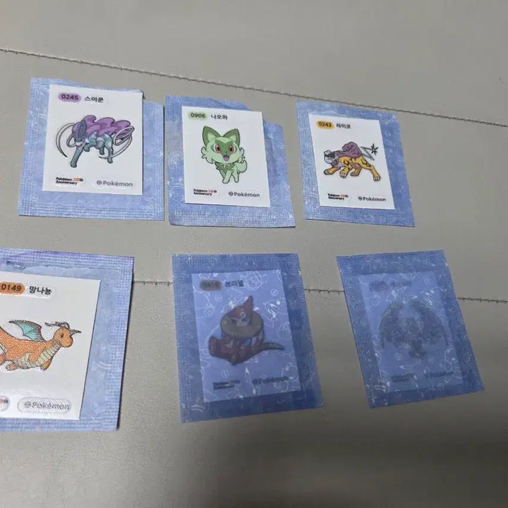 [BUNJANG] Pokemon Stickers 6-Piece Bundle: Lunala, Dragonite, Suicune, Buizel, Rowlet, Raikou / 포켓몬 띠부실 루나아라 망나뇽 스이쿤 브이젤 나오하 라이코 6종일괄