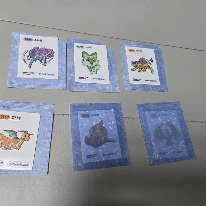 [BUNJANG] Pokemon Stickers 6-Piece Bundle: Lunala, Dragonite, Suicune, Buizel, Rowlet, Raikou / 포켓몬 띠부실 루나아라 망나뇽 스이쿤 브이젤 나오하 라이코 6종일괄