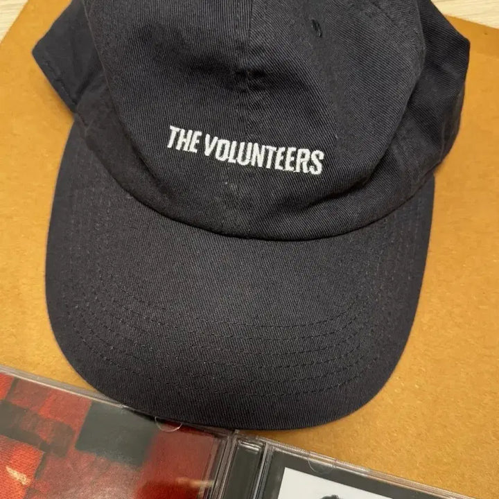[BUNJANG] The Volunteers Early Goods Hat / 더발룬티어스 초기 굿즈모자