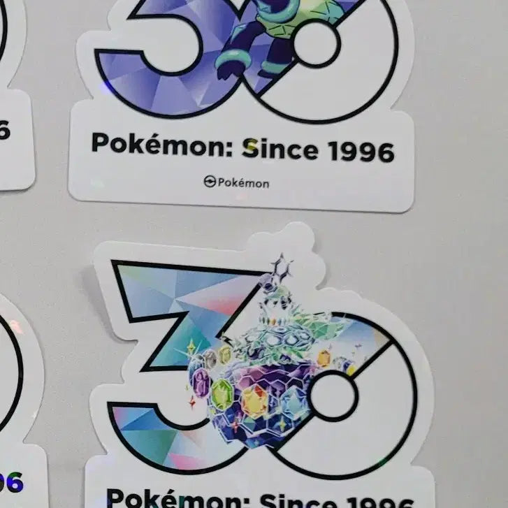 [BUNJANG] Pokemon 30th Anniversary Logo Sticker Set (Normal Form, Stellar Form) / (교환/판매) 포켓몬 30주년 로고 스티커 테라파고스 노말폼 스텔라폼 2장 세트