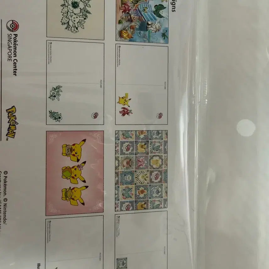 [BUNJANG] Pokemon Pikachu Coin &amp; Postcard Set (Singapore Limited Edition) / 포켓몬 엽서 및 피카츄 코인 (싱가폴 한정판)