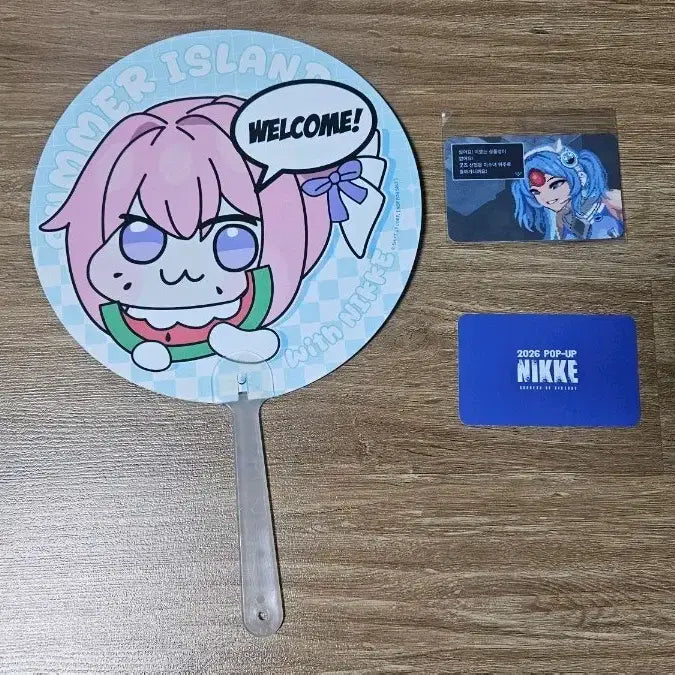 [BUNJANG] NIKKE: Goddess of Victory Summer Pop-up 2023 Dororong Fan + Jewel Coupon Bundle Set / NIKKE 승리의여신 :니케  여름팝업2026  도로롱부채 + 쥬얼쿠폰 300,1500 일괄